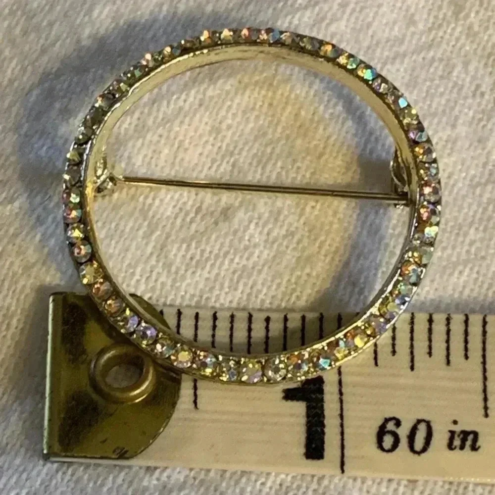 Vintage “Circle of Life” pin/ brooch gold tone iridescent glass crystals Unisex